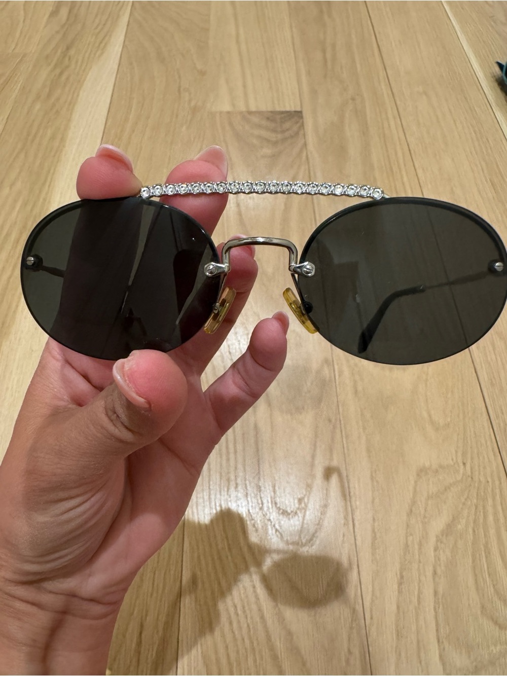 Miu Miu Oval Black Lens Societe rimless Sunglasses with Crystal Brow Bar